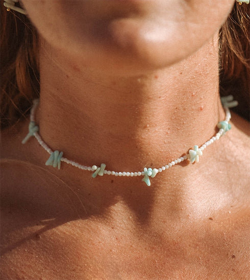 LYRA REEF and pearl necklace
