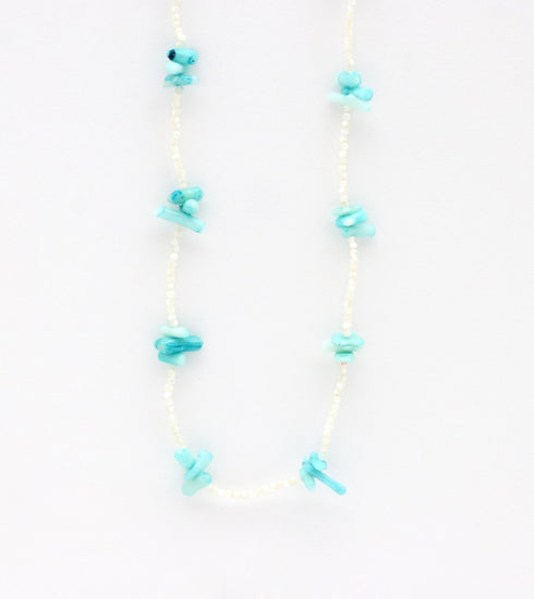 LYRA REEF and pearl necklace